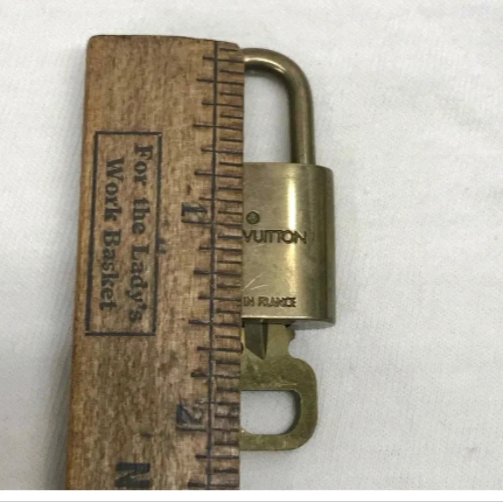 Authentic Louis Vuitton Lock & Key # 310 - Picture 4 of 11